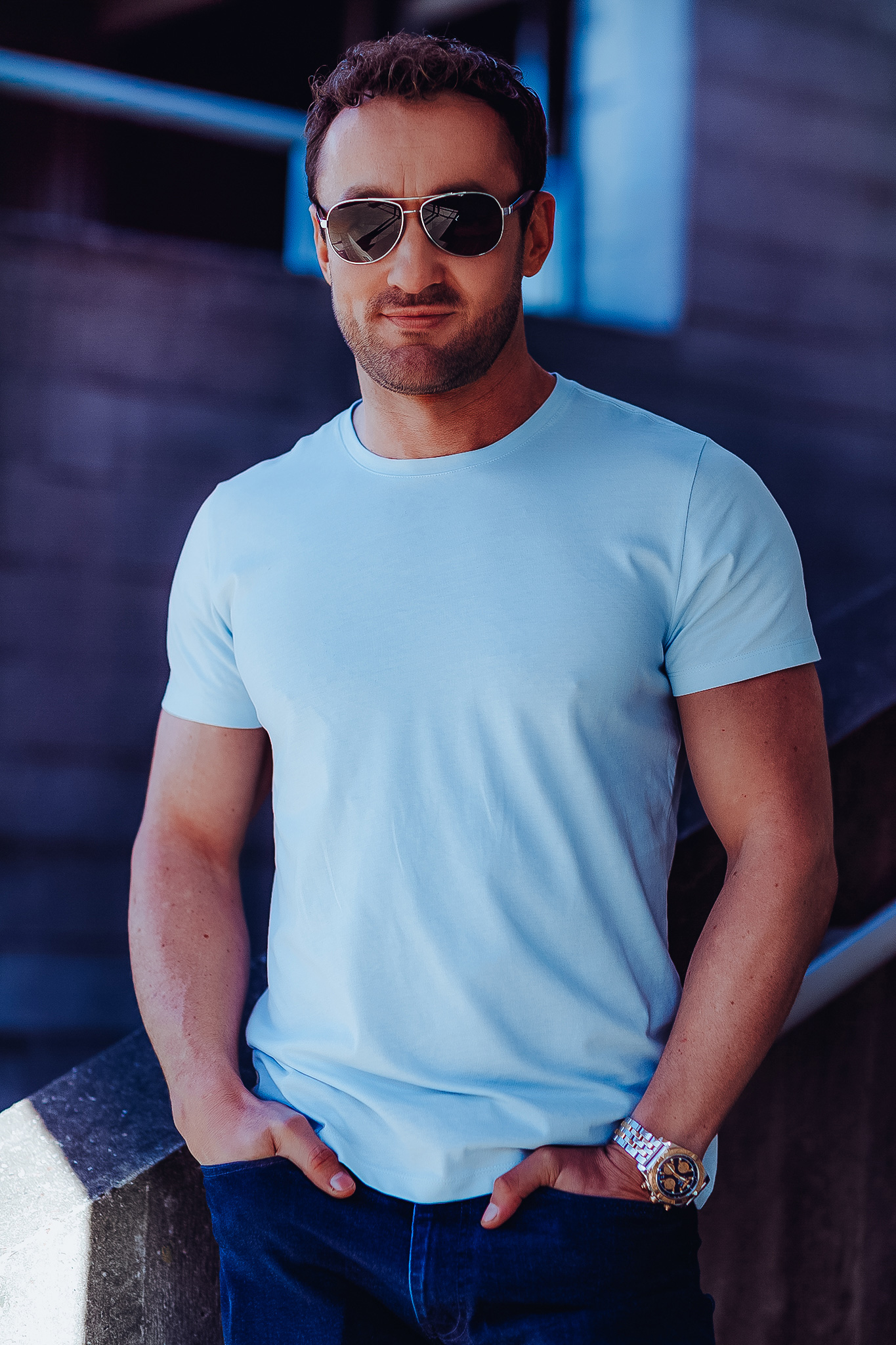 James Rostance in a light blue T Shirt with Sunglasses